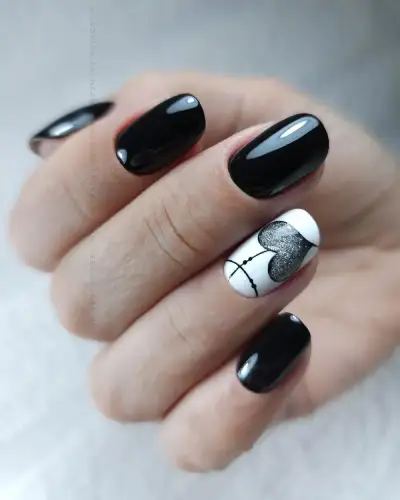 Chic and Edgy Black Valentine’s Day Nails You’ll Fall in Love With